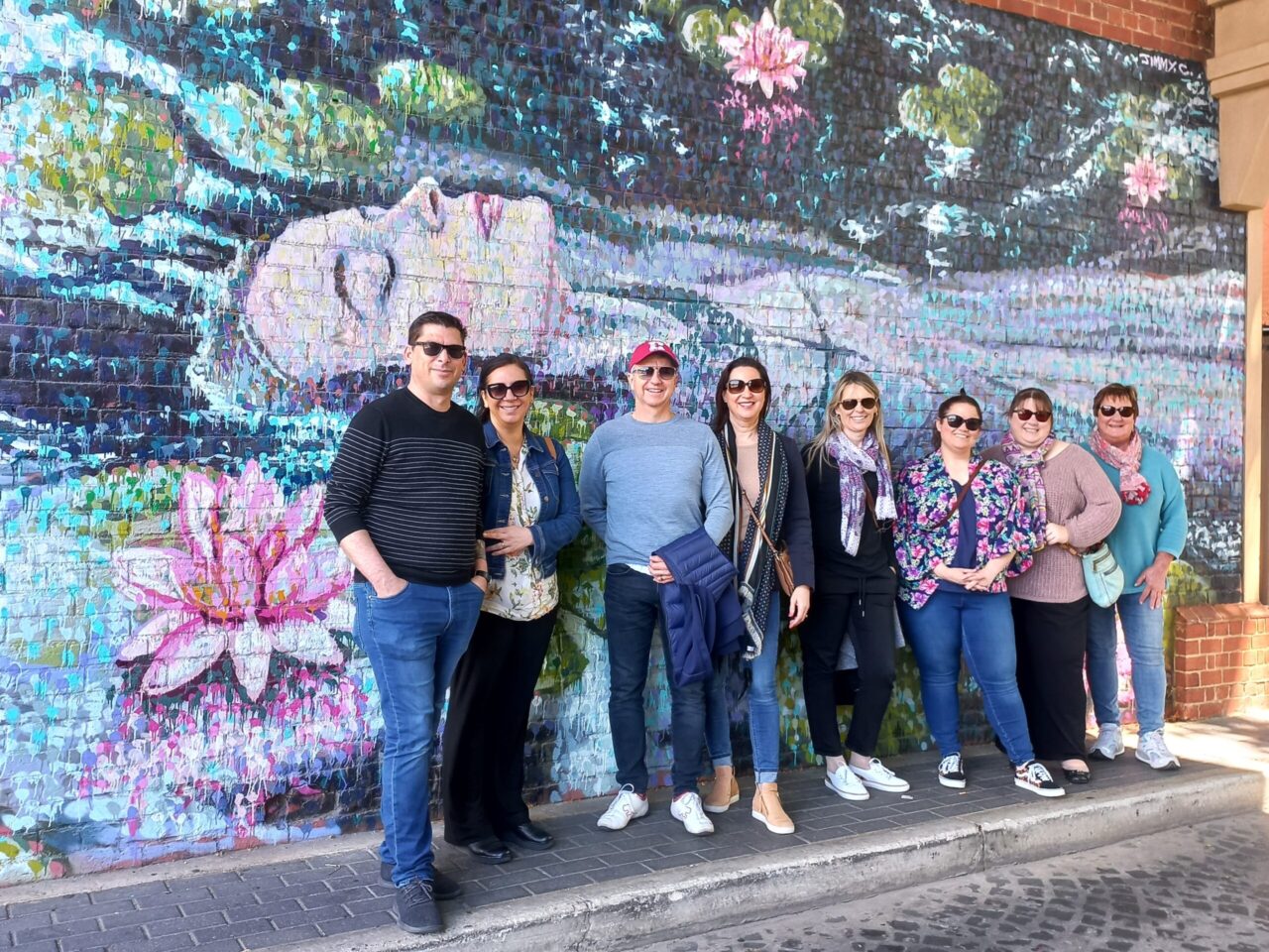Flamboyance Tours group photo at Jimmy C's Ophelia piece on Pain and Palate trip